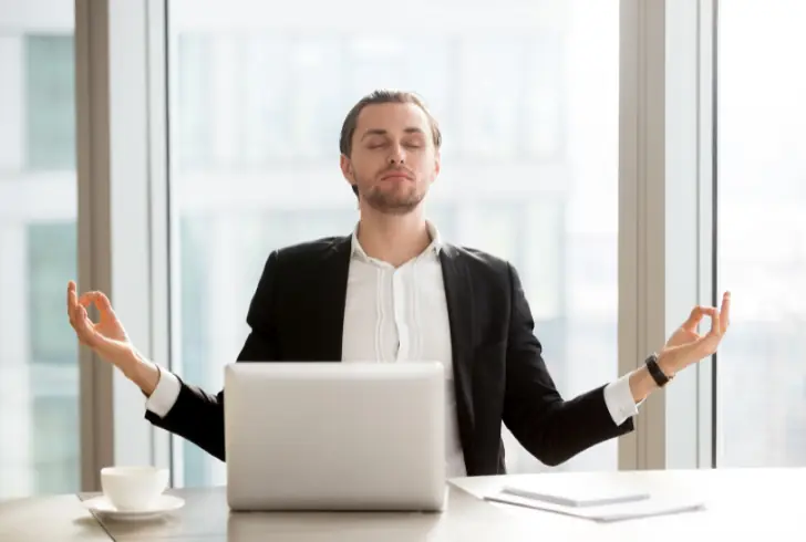 Person practicing mindful breathing